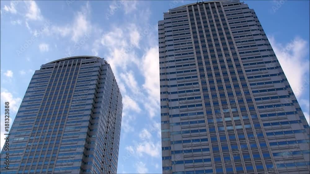 Modern office buildings with clouds time lapse Modern office buildings with clouds time lapse