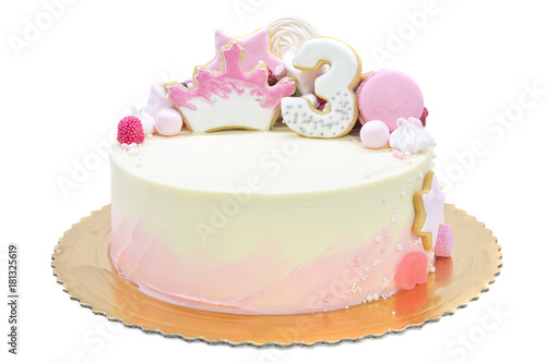 Pink cake for third birthday isolated on white