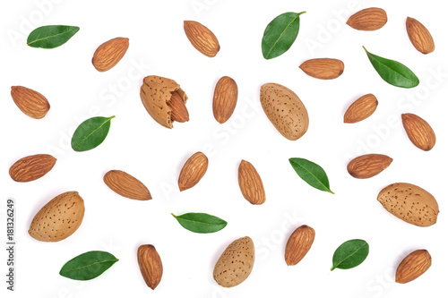 almonds with leaves isolated on white background. Flat lay pattern. Top view