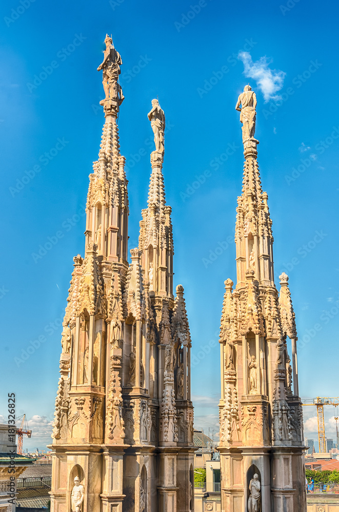 Spiers and statues on the gothic Cathedral of Milan, Italy Spiers and statues on the gothic Cathedral of Milan, Italy