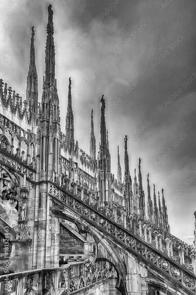 Spiers and statues on the gothic Cathedral of Milan, Italy