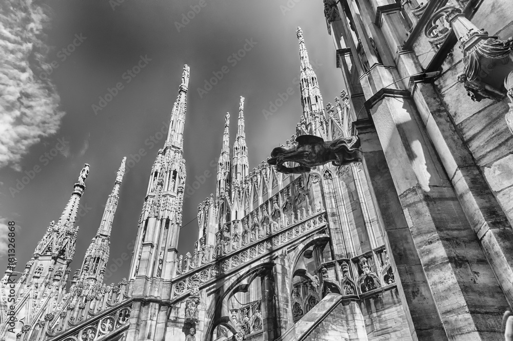 Spiers and statues on the gothic Cathedral of Milan, Italy