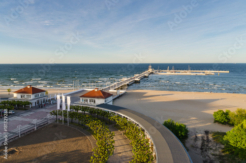 View of wooden pier and beautiful sandy beach in Sopot resort. Baltic Sea, Poland. © vivoo