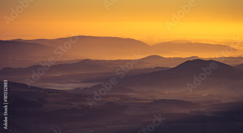 Misty mountain landscape in the morning, Poland © tomeyk
