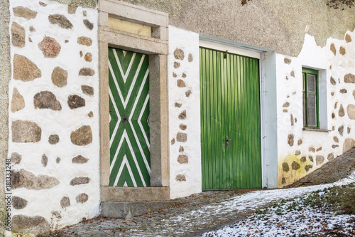 traditional farmhouse with green door