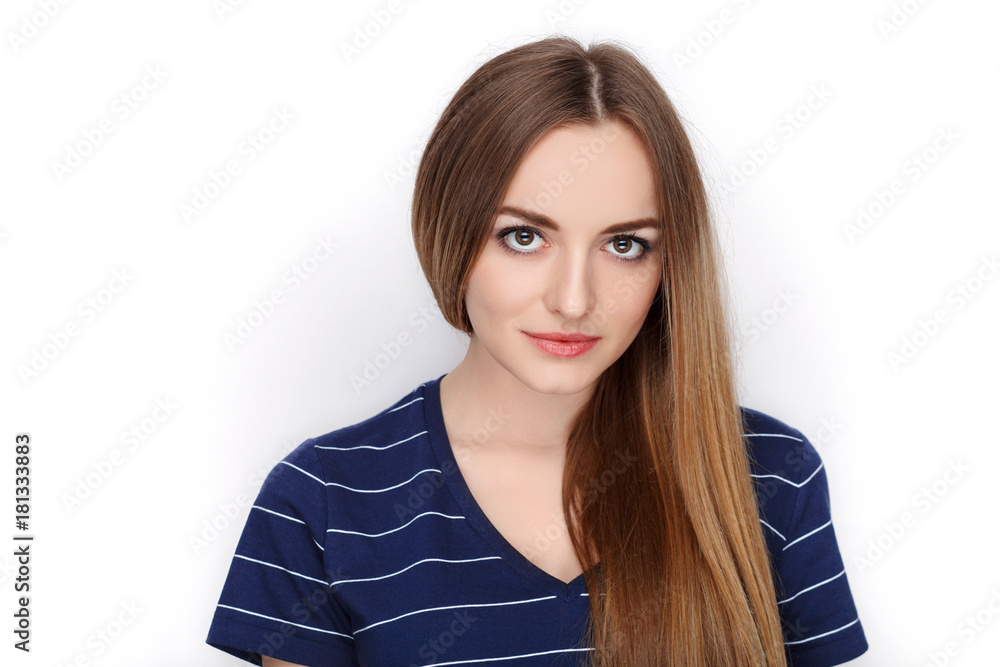 Beauty portrait of young adorable fresh looking blonde woman in blue t shirt. Emotion and facial expression concept. Beauty portrait of young adorable fresh looking blonde woman in blue t shirt. Emotion and facial expression concept.