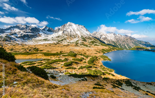 Tatra mountains, autumn valley panorama with lake, sunny day