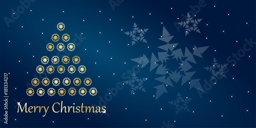 gold christmas tree in a beautiful night
