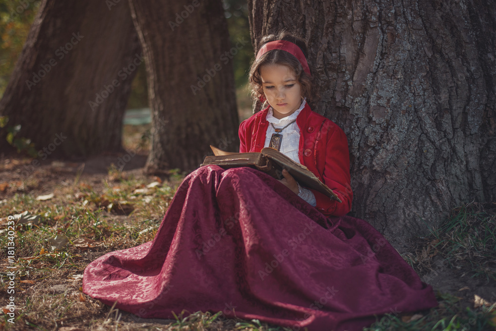 Cute little caucasian girl wearing retro clothes. Nice female child in beautiful vintage dress. Cute little caucasian girl wearing retro clothes. Nice female child in beautiful vintage dress.