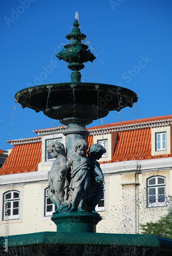 Baroque style bronze fountain on Rossio square in Lisbon, Portugal