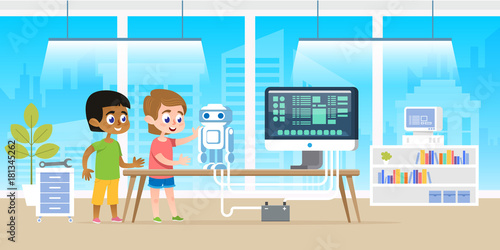Little boy with his afro american friend programming robot by the computer technology at modern classroom office.