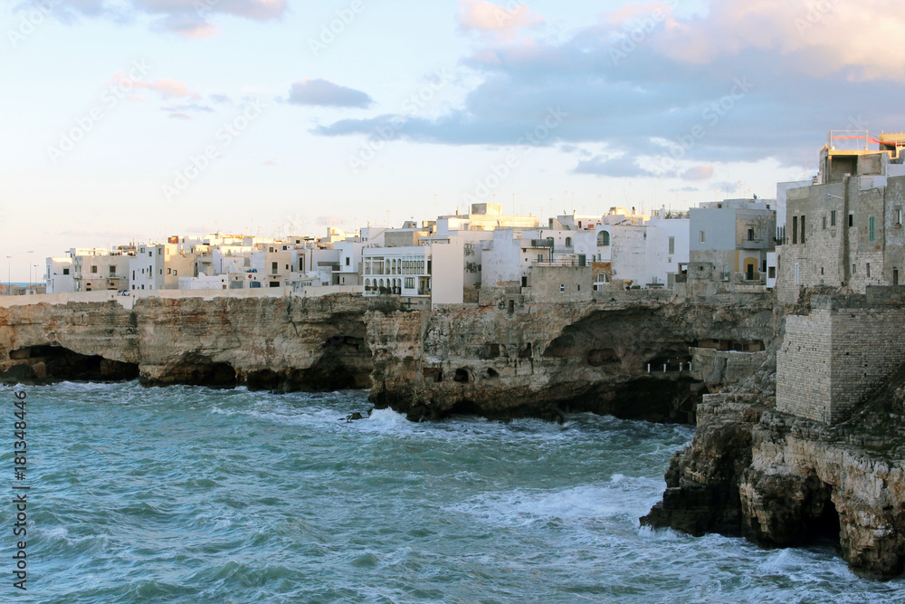 Polignano a Mare enters with the Bastion of Santo Stefano on the right