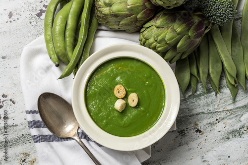 Green vegetable cream soup photo