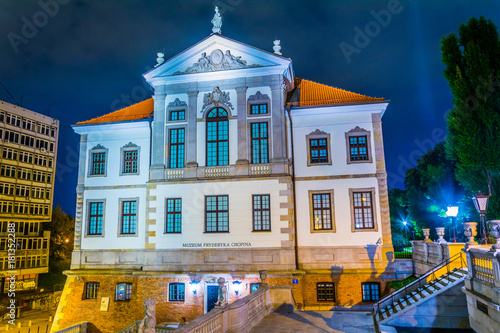 Frederic Chopin Museum at the Ostrogski Palace building during night in Warsaw, Poland photo