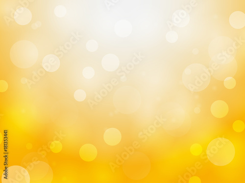 Abstract yellow bokeh circles and light on yellow background using for Christmas or Happy new year background, festive background with defocused light.