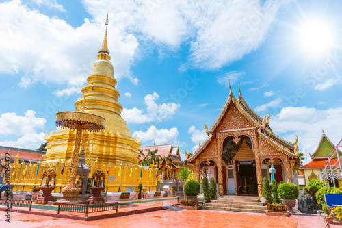 Beautiful Golden Pagoda at Wat Phra That Hariphunchai popular temple travel location at Lamphun Thailand