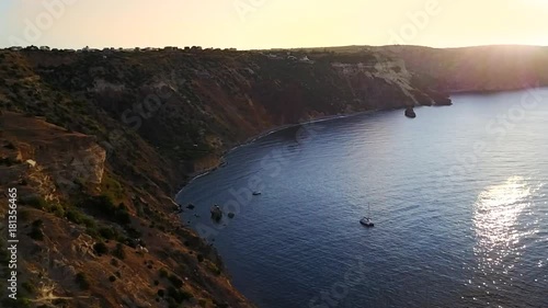 seascape. camera flies over the sea and rocks , video from the drone, flight over the sea