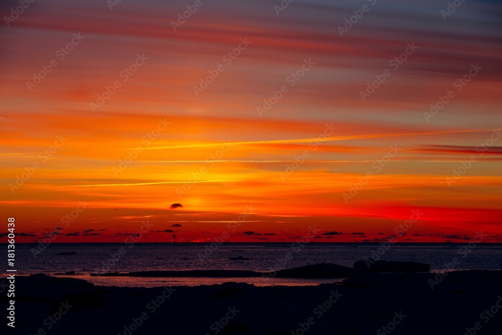 Winter nature landscape. Sunset over frozen sea. Winter nature landscape. Sunset over frozen sea.