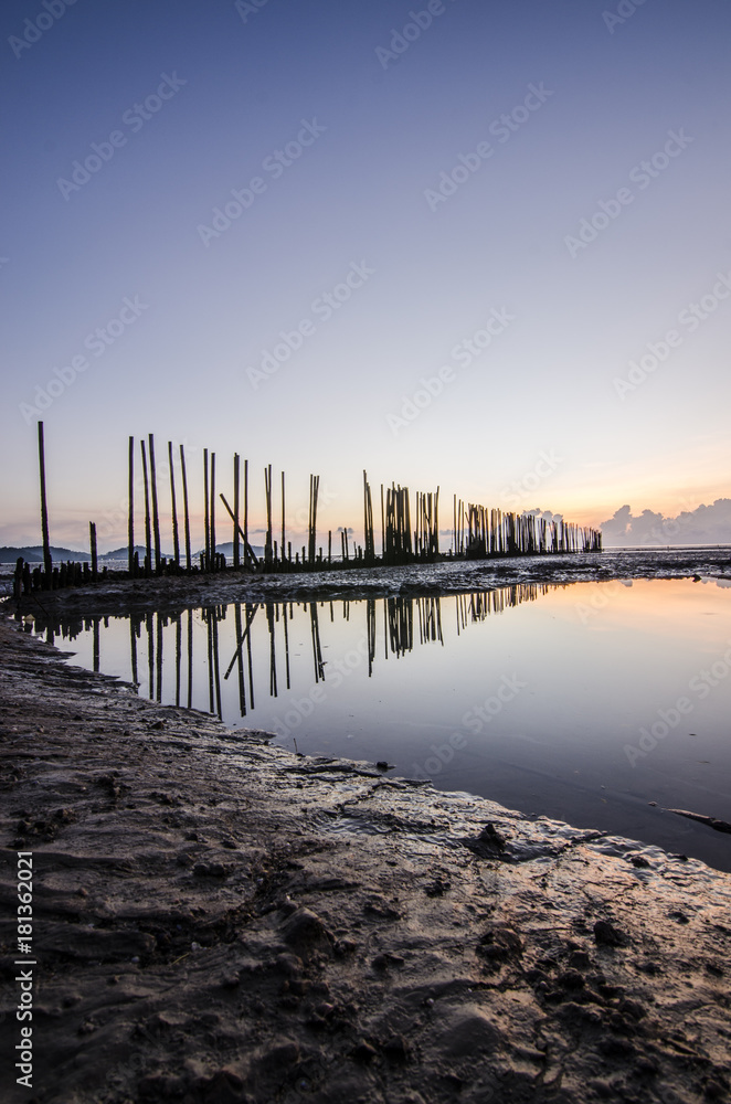 sunrise light on the beach with muddy wave , clay wave sunrise light on the beach with muddy wave , clay wave