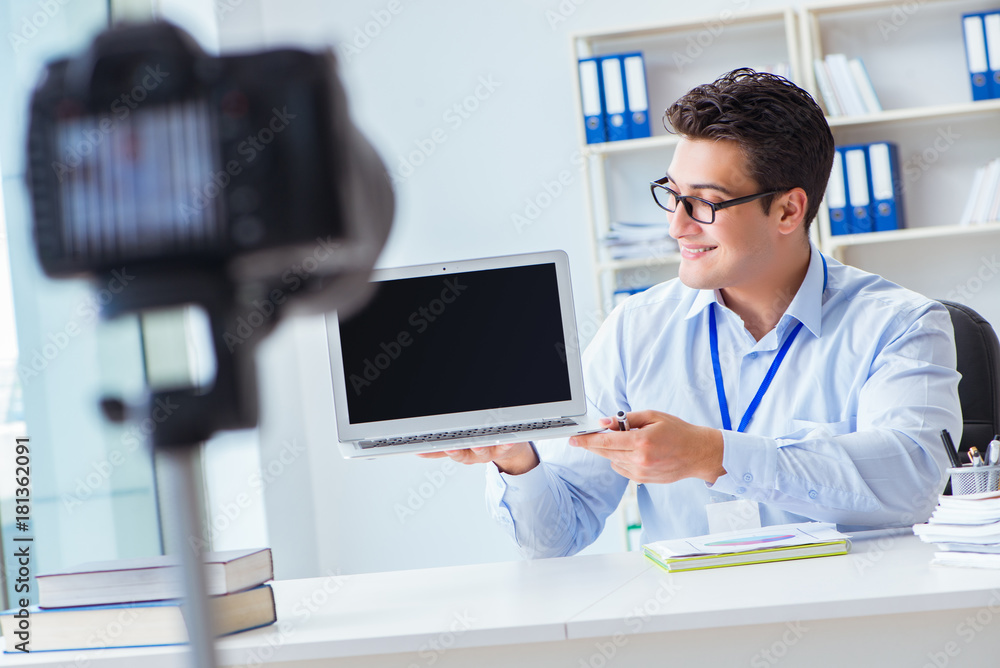 Fototapeta premium Business blogger doing webcast for his subscribers