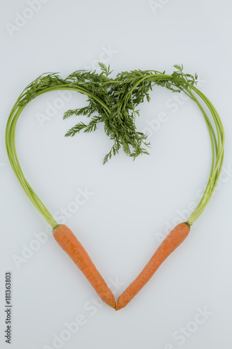 fresh carrots in heart shape photo