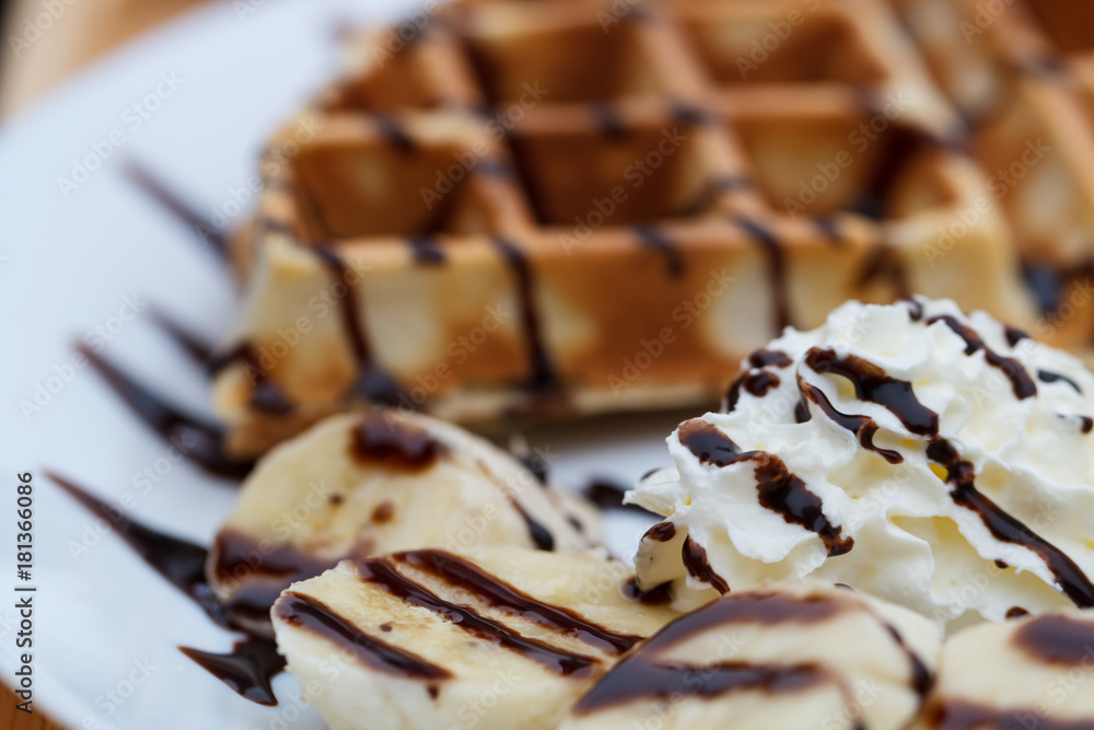 Close-up of delicious waffles and banana Close-up of delicious waffles and banana