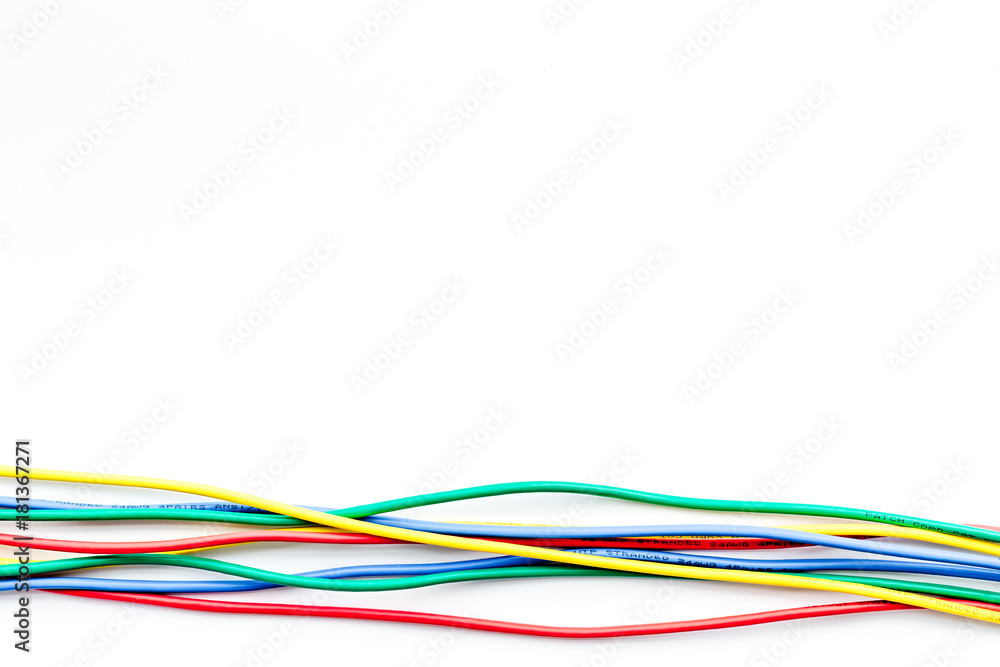 Network cables for computer on white background top view copyspace Network cables for computer on white background top view copyspace