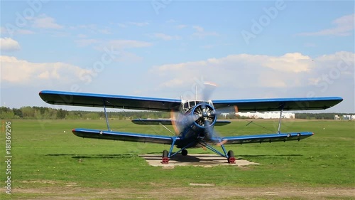 Plane AN-2 is preparing to take off photo