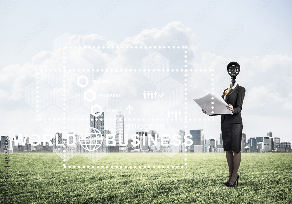 Camera headed woman standing on green grass against modern citys Camera headed woman standing on green grass against modern citys