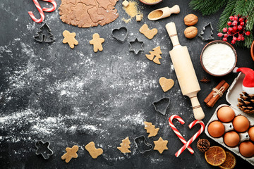 Baking christmas cookies on grey wooden table