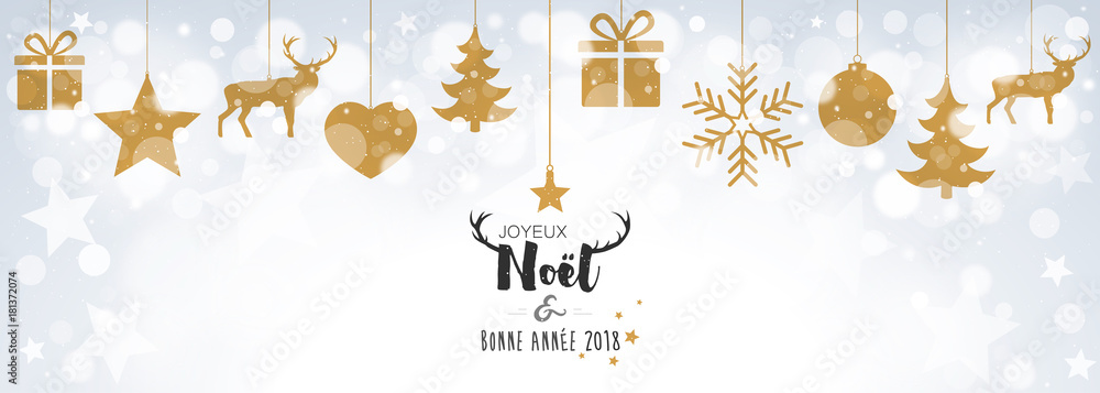 Carte avec boules dorées suspendues