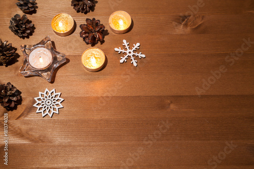 Christmas greeting card background; holidays composition on wood background with copy space for your text