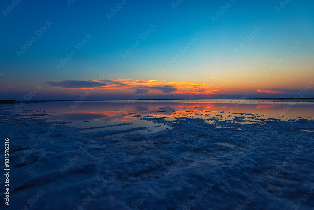 Beauty sunset on salty lake in Altay, Siberia, Russia