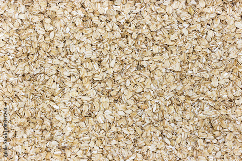 Oatmeal background. Oat flakes texture