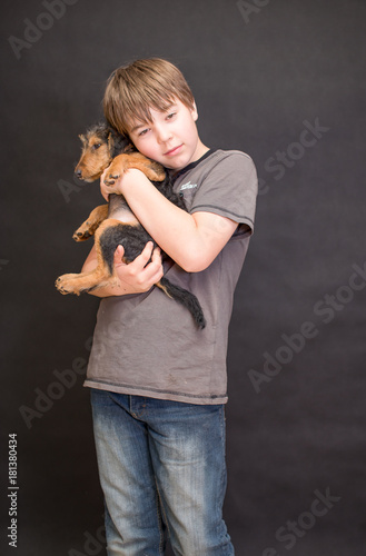 Картината върху платно Happy boy portrait, boy and dog in love