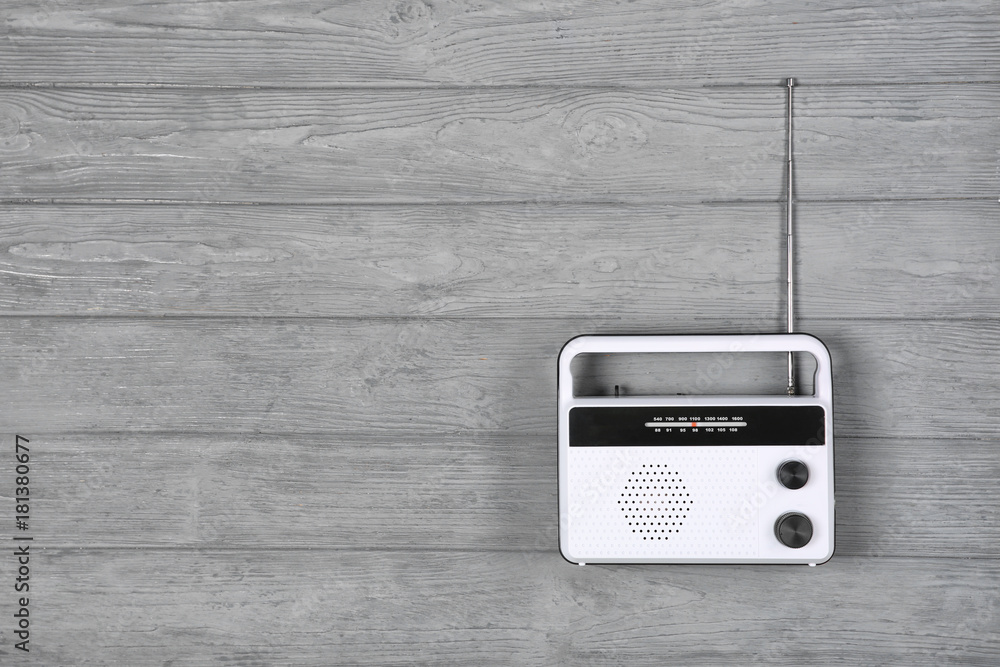 Retro radio on wooden background Retro radio on wooden background