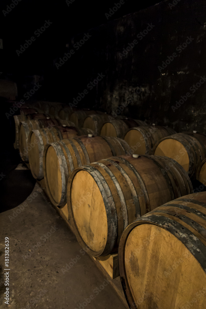 Wine barrels drilled in the basement