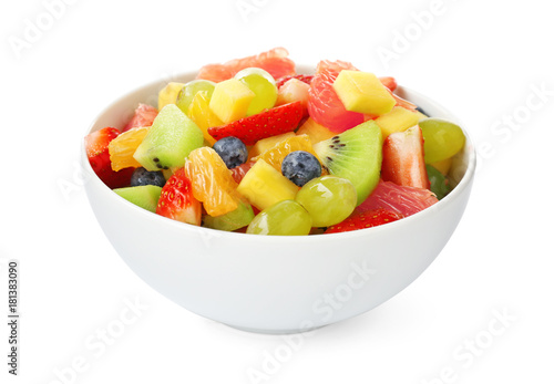 Bowl of fresh fruit salad, isolated on white