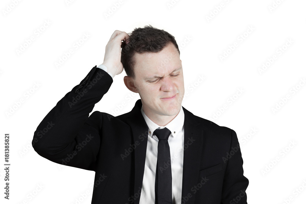 Confused Caucasian worker scratching head Confused Caucasian worker scratching head
