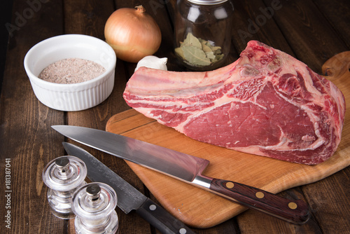 Raw Grass Fed Prime Rib Meat with Herbs, Vegetables and Spice Rub