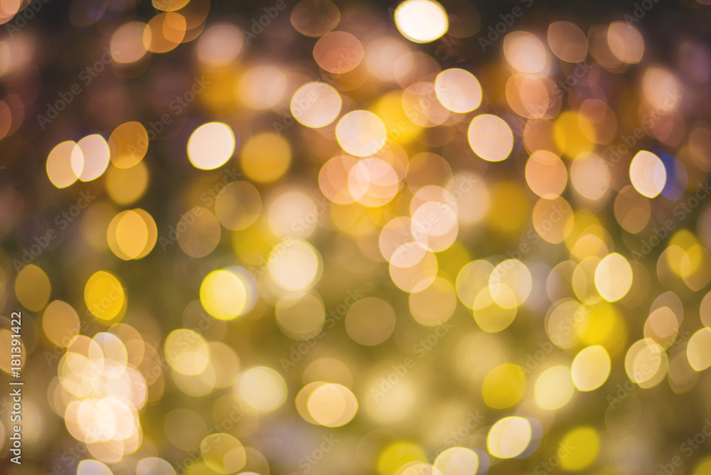 Gold abstract bokeh background glittering stars for christmas and new year event Gold abstract bokeh background glittering stars for christmas and new year event