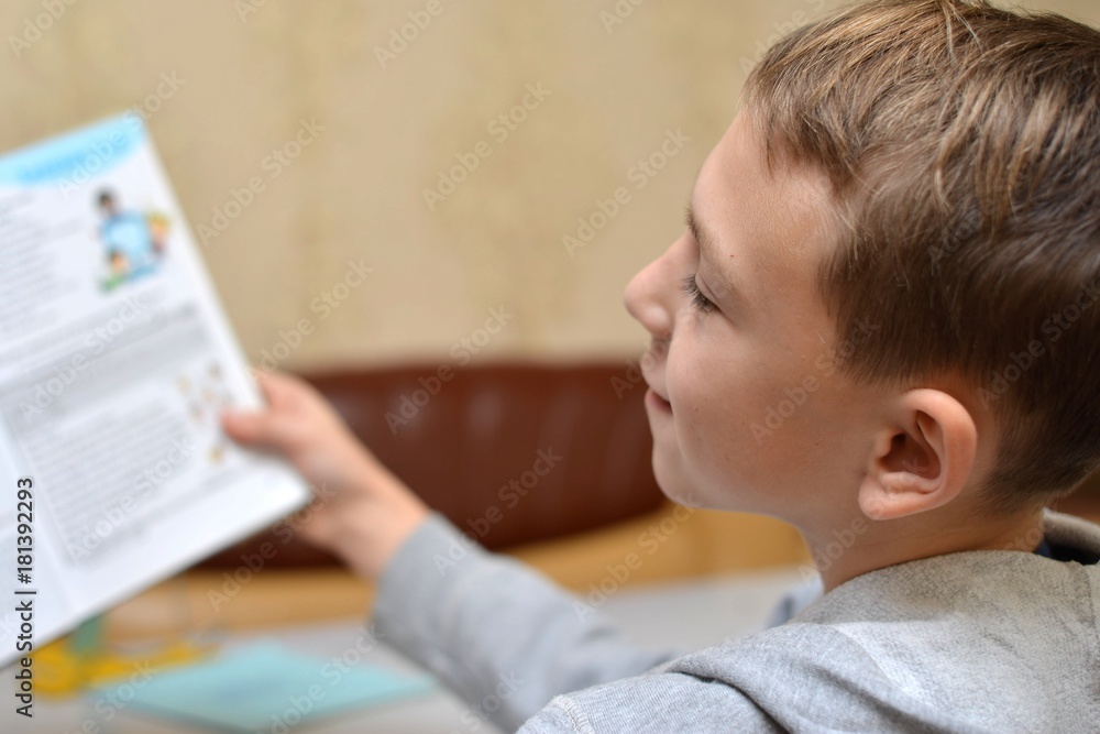 Selective focus of little boy learning how to write his name, Kid study at home, Children do homework at home, Concept for toddler learn about writing the letter or message Selective focus of little boy learning how to write his name, Kid study at home, Children do homework at home, Concept for toddler learn about writing the letter or message
