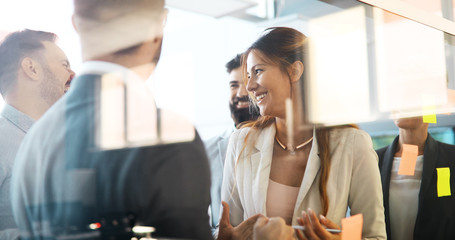 Collaboration and analysis by business people working in office