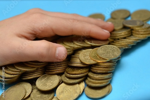 Save money for retirement and account banking for finance concept, Man hand with coin money on business office table vintage style photo