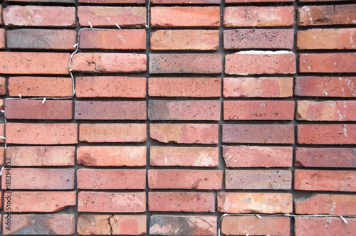 Clean semetry neat orange brick wall background photo