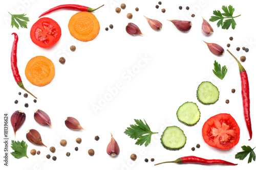 mix red hot chili peppers with parsley and sliced carrot and garlic isolated on white background top view