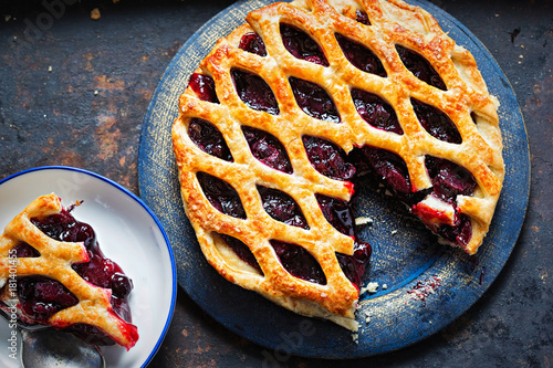 Lattice autumn fruit pie, with blackcurrant, blackberry, cherry compote in puff pastry pie  photo