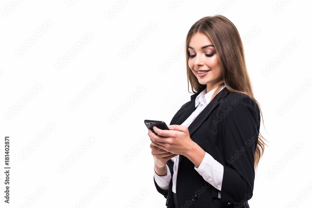Portrait of a smiling casual woman holding smartphone over white Portrait of a smiling casual woman holding smartphone over white