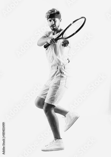 A tennis player is playing on a white background. © ASDF