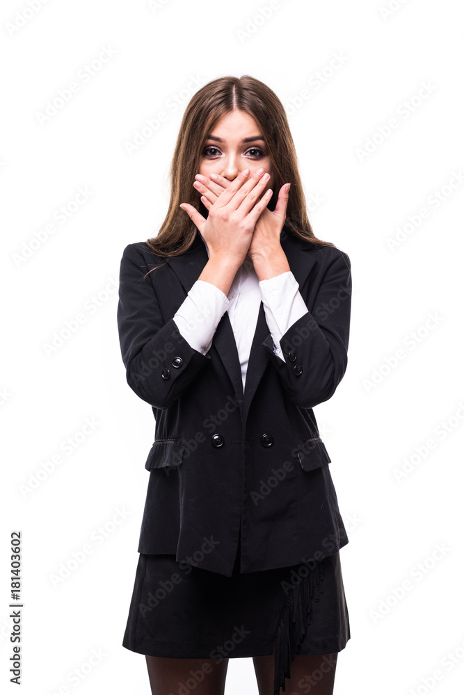 Frightened business woman, covering her mouth with her hands, against the white studio background. Frightened business woman, covering her mouth with her hands, against the white studio background.